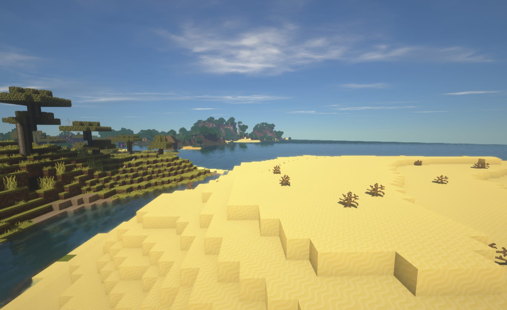 Screenshot of Minecraft game (Using PureBDCraft Minecraft Resource pack https://bdcraft.net) depicting: Landscape with Savanah and forest on the left, a river split down the middle surrounding a beach on the right.